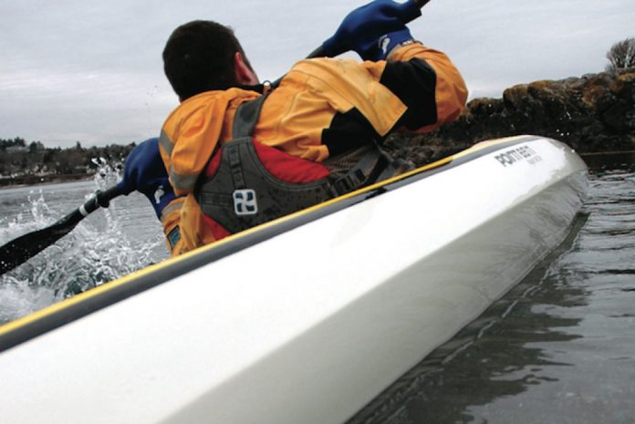 Man paddles a Point 65 Whisky 16 kayak