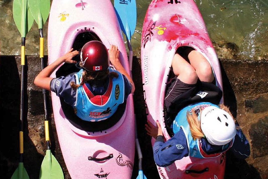 Two paddlers sit inside Jackson Star Series 2010 kayaks
