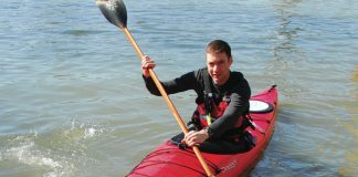man paddling a Dagger Alchemy 14.0 S sea kayak