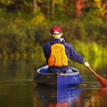 Evolution of the Pack Boat Canoe Person paddles in a pack boat canoe