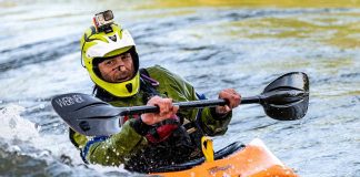 Man kayaking and wearing GoPro on his hlmet