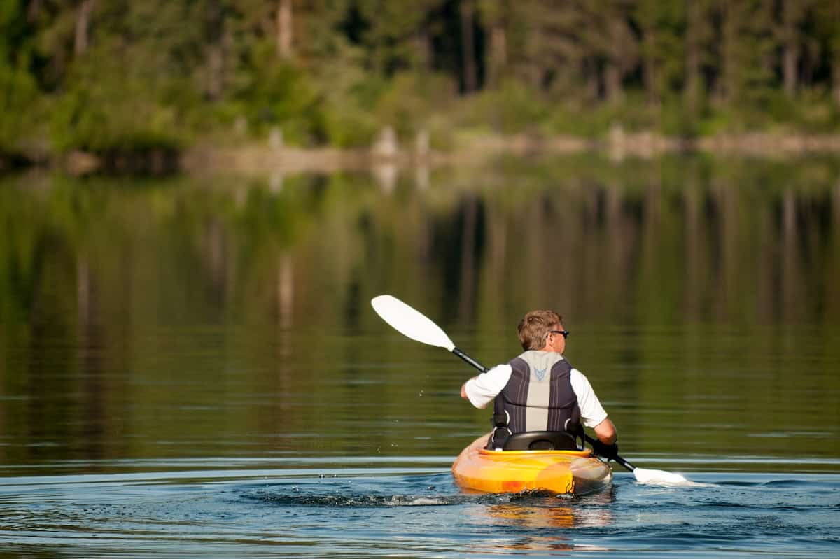 man kayaking whitefish lake Montana