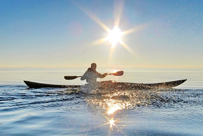 sea kayaking on the ocean to practice important safety skills