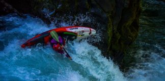 Person in whitewater kayak