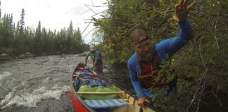 Frank Wolf testing an Esquif Canyon canoe in T-Formex