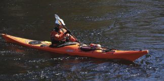 man paddling a P&H Scorpio MKII HV touring kayak