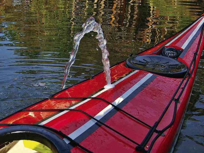 battery-operated kayak bilge pump in operation