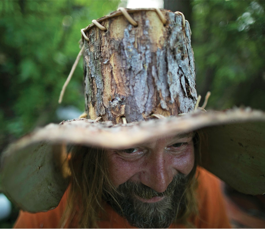 Mike Ranta Wearing Hat Made From Bark Of Tree