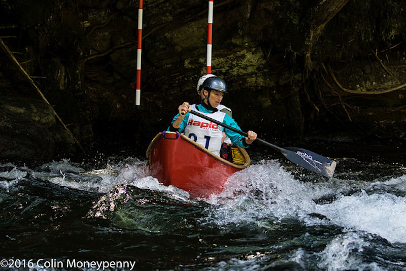 Two canoeists race on the Gull River