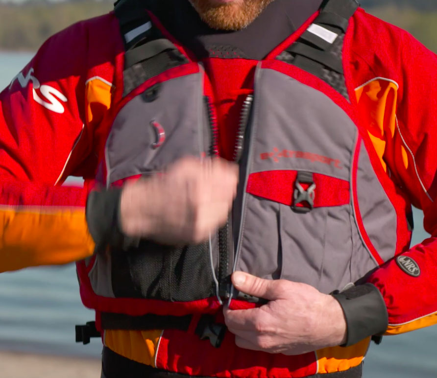 How to snuggly zip up a lifejacket.