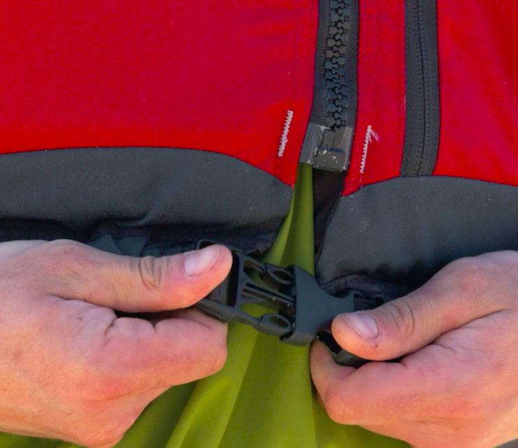 Clipping in a life jacket.