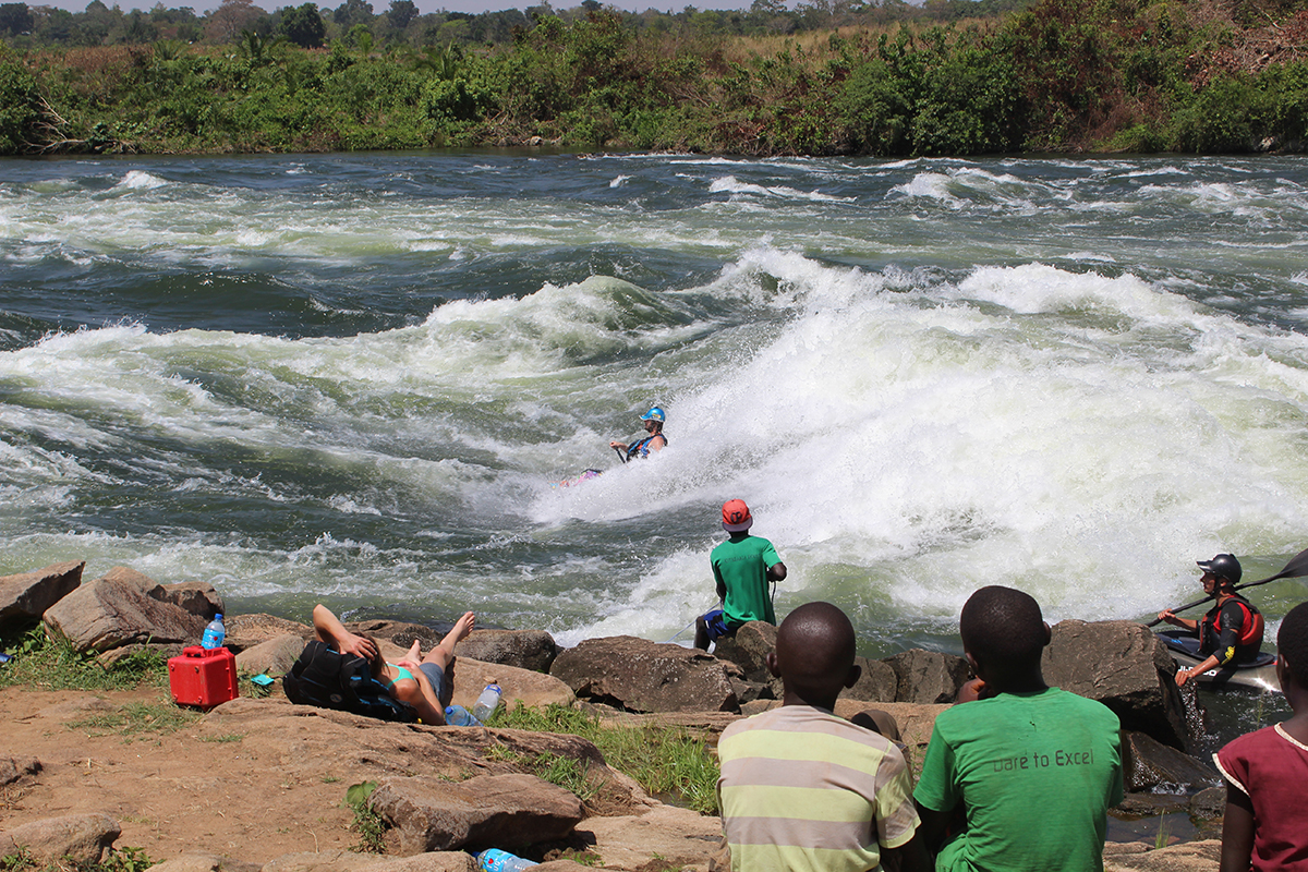 Jonas Unterberg surfs while onlookers watch