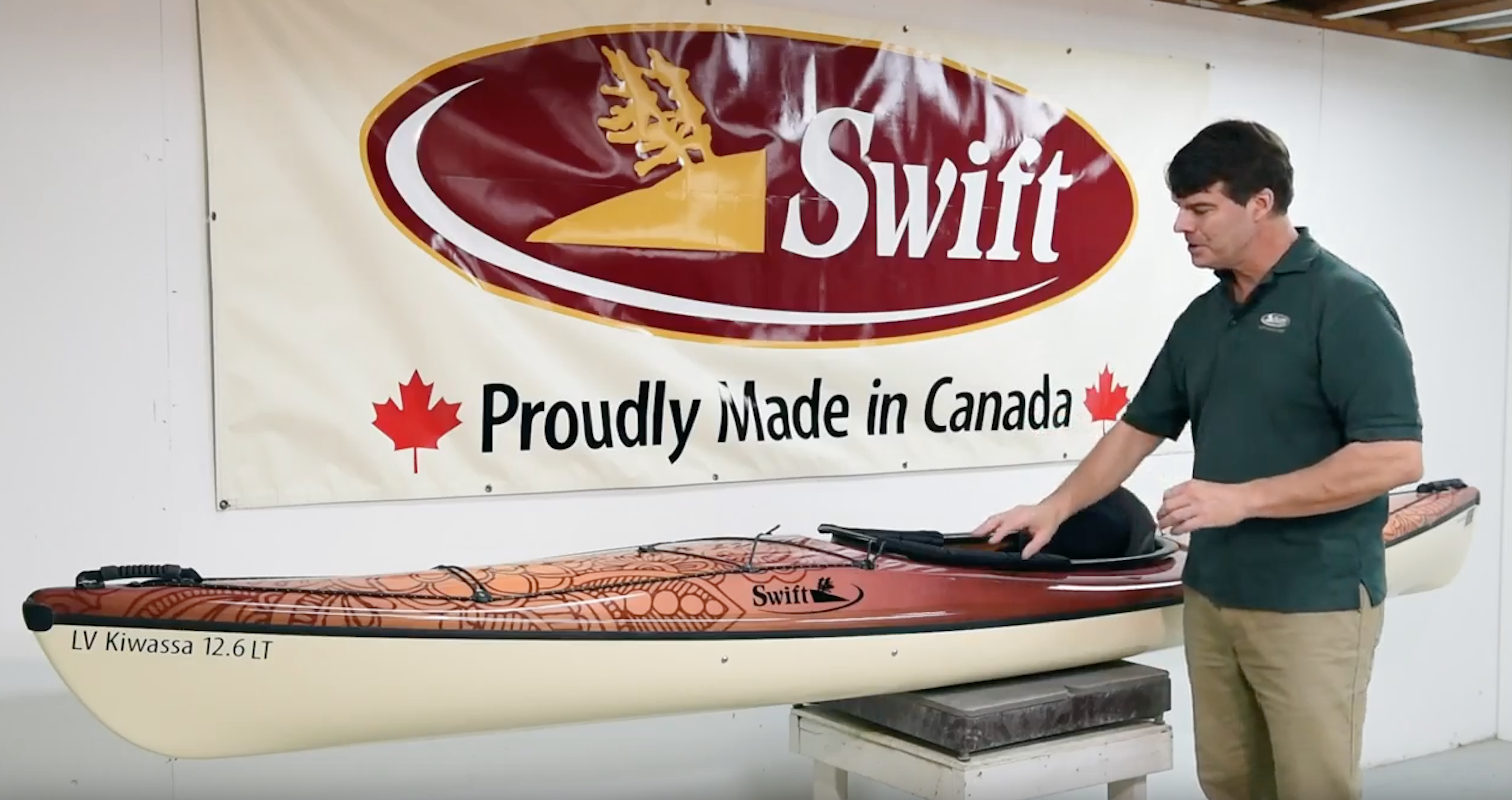 Bill Swift stands in front of the updated LV Kiwassa 12.6  recreational kayak.
