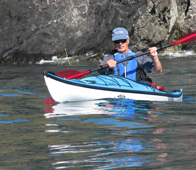 Tom at Deception Pass paddling an Eddyline Kayaks Falcon 16