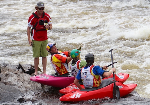 Dane Jackson celebrates with Zachery Zwanenburg and Seth Chapelle following a top three finish in the C1 division at the ICF World Freestyle Kayak Championships. 