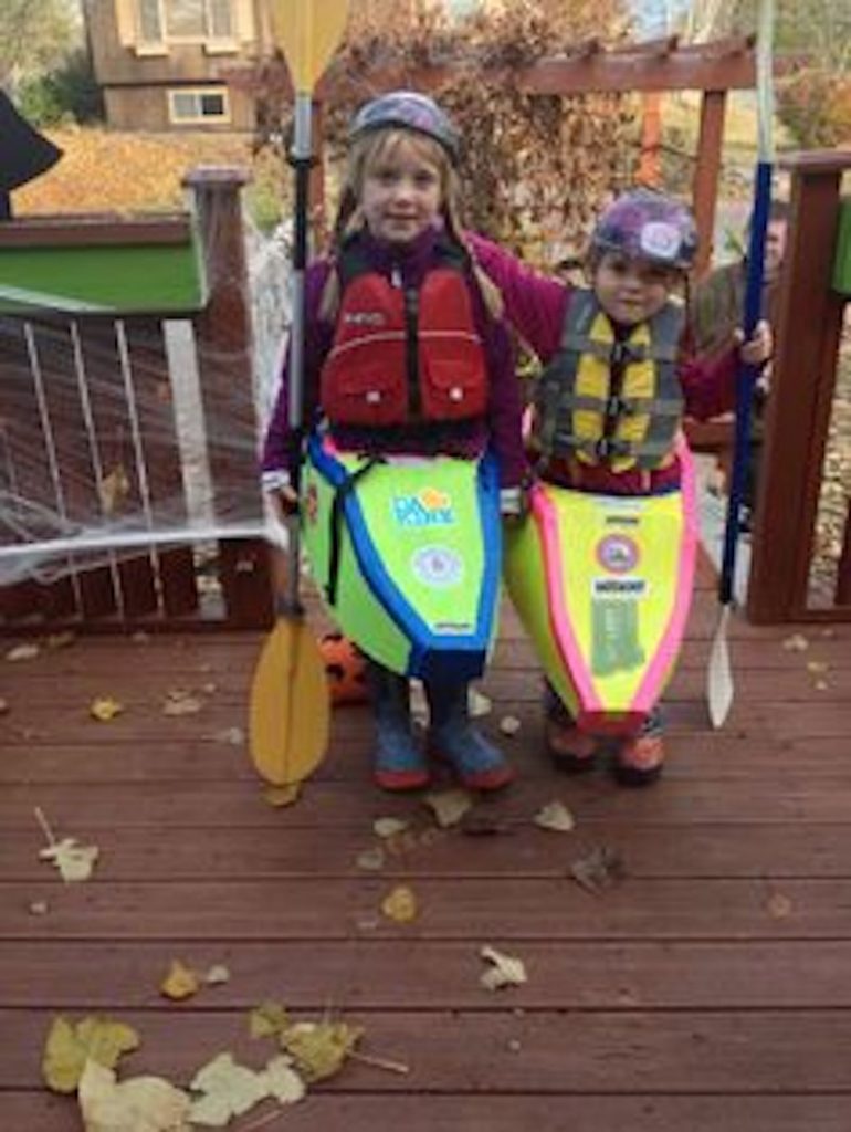 Small children in kayak halloween costumes