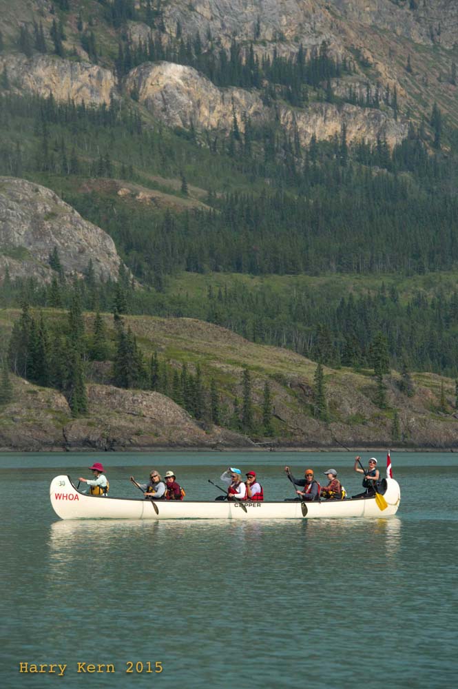 Canoeists paddling during the Yukon River Quest race 