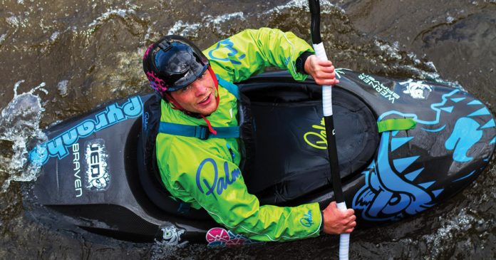 kayaker Brent Orton looking up at photographer