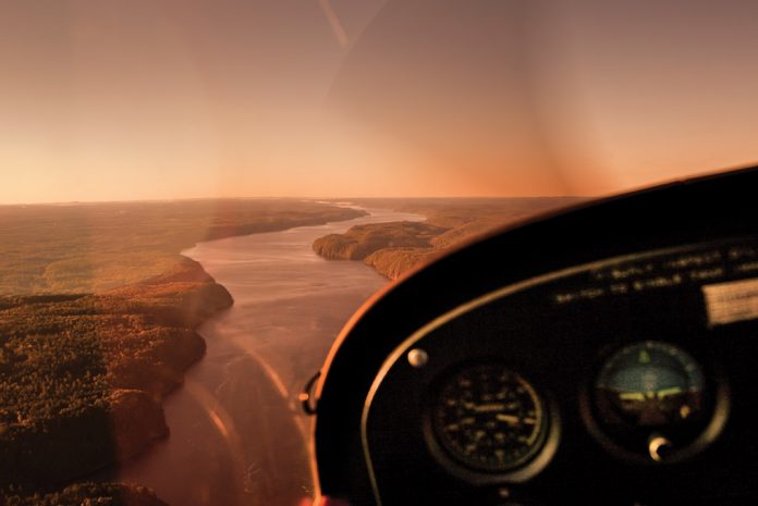view of a river from a planes cockpit