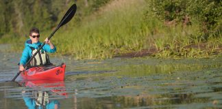 woman paddling Stellar Kayaks' Stellar Intrepid LV touring kayak
