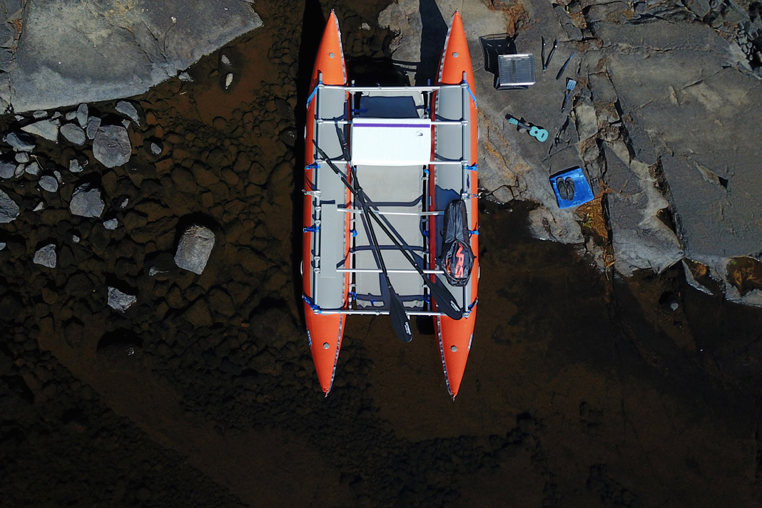 an oar rig surrounded by paddling gear