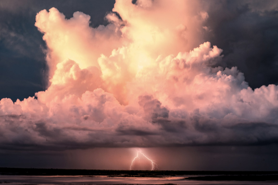 lightning strike from a cloud over water