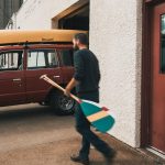 21 Things Every Canoeist Should Know man walking towards his canoe and truck