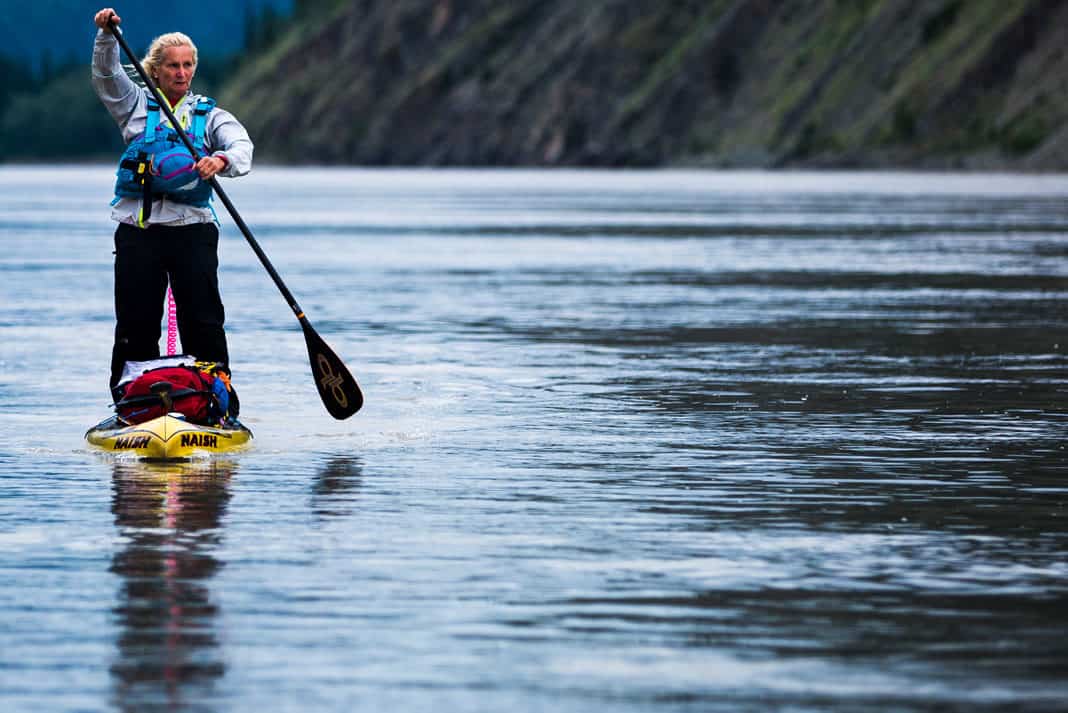Joanne Hamilton paddling on an open lake