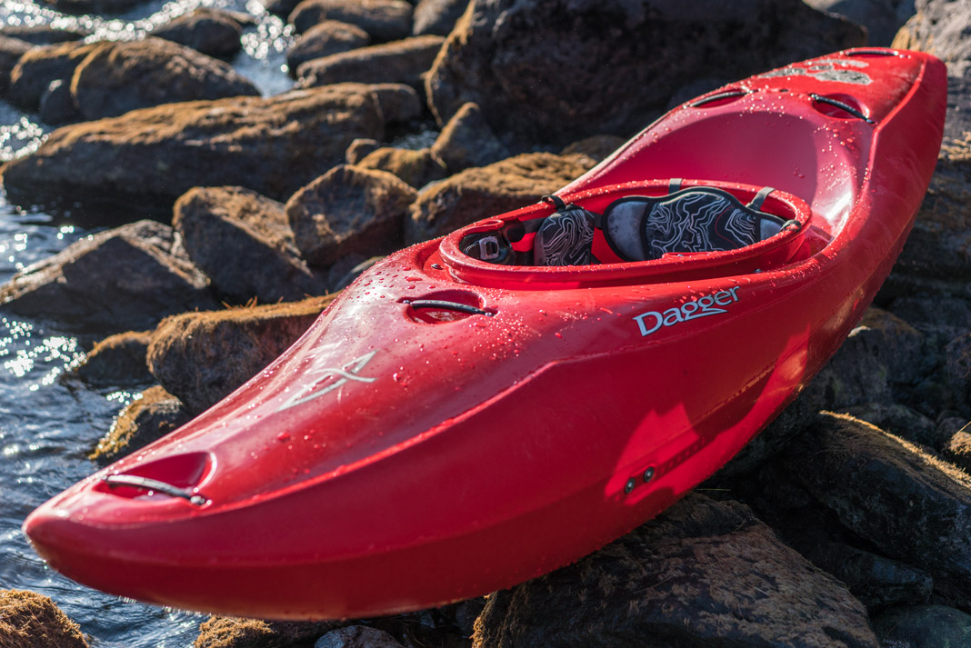 a view of Dagger Kayak's Phantom creek boat in red