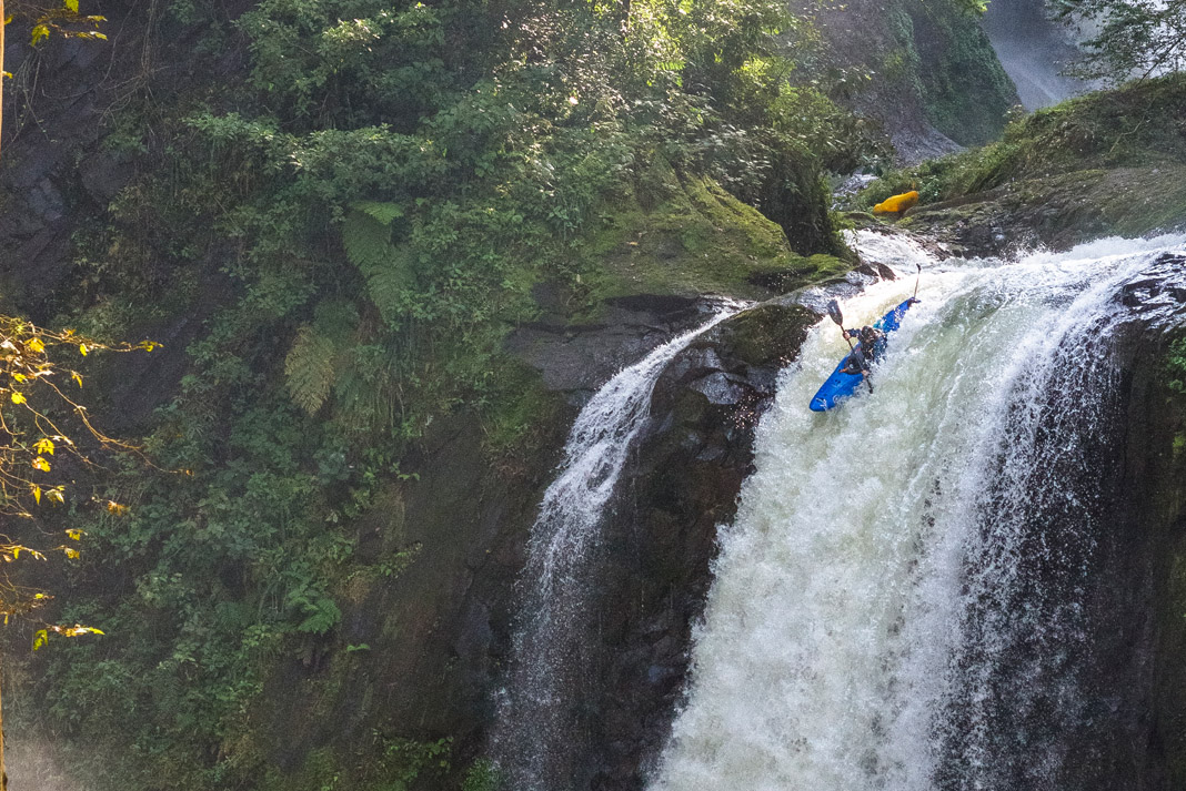 whitewater kayaking off a waterfall in Mexico