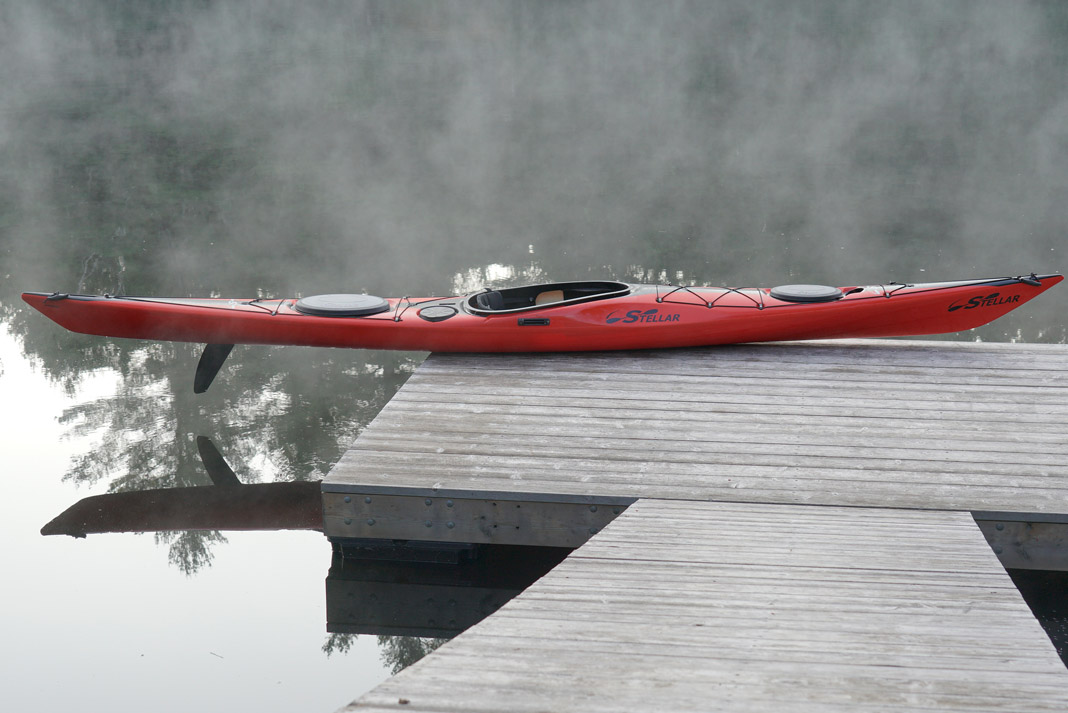 Stellar Kayaks’ intrepid LV sea kayak side view sitting on dock