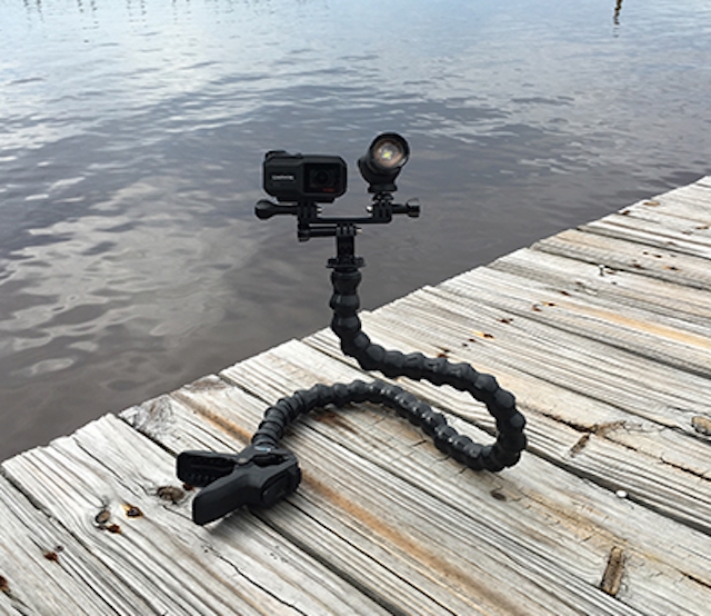 GoPro sitting on a dock with clamp gooseneck extension
