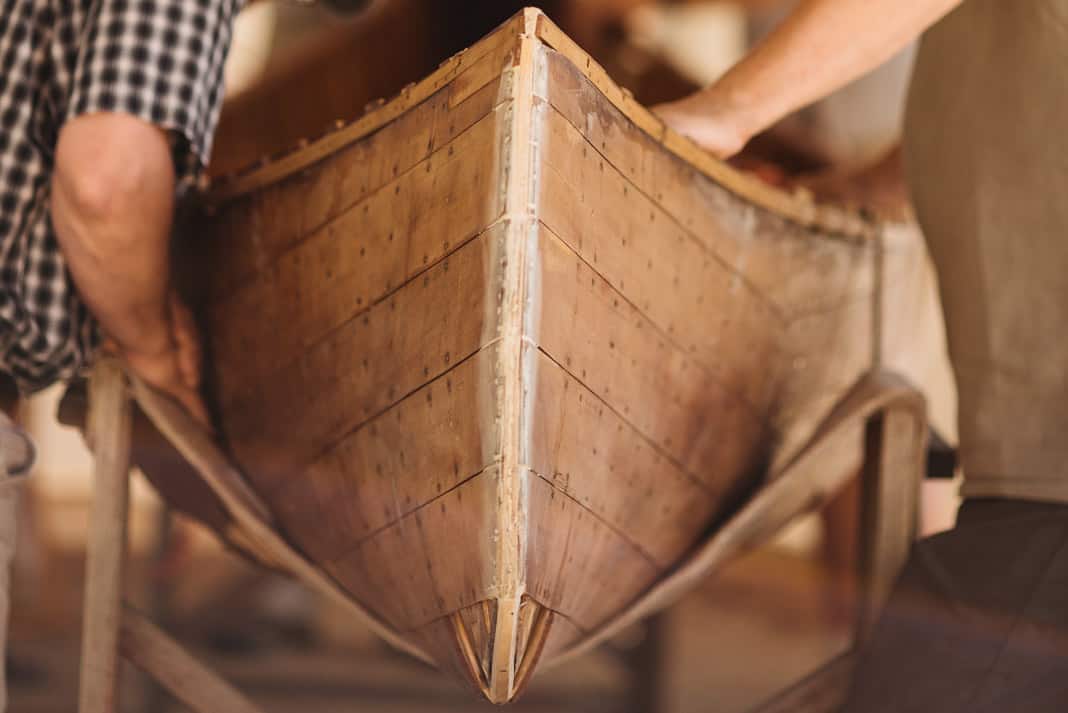Bow view of a wooden canoe