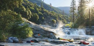 Paddlers Sleep Next To The River