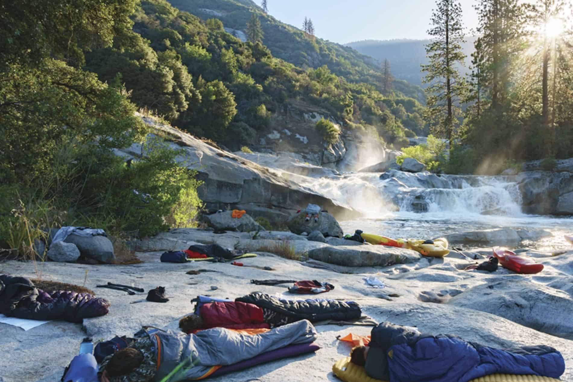 Paddlers Sleep Next To The River