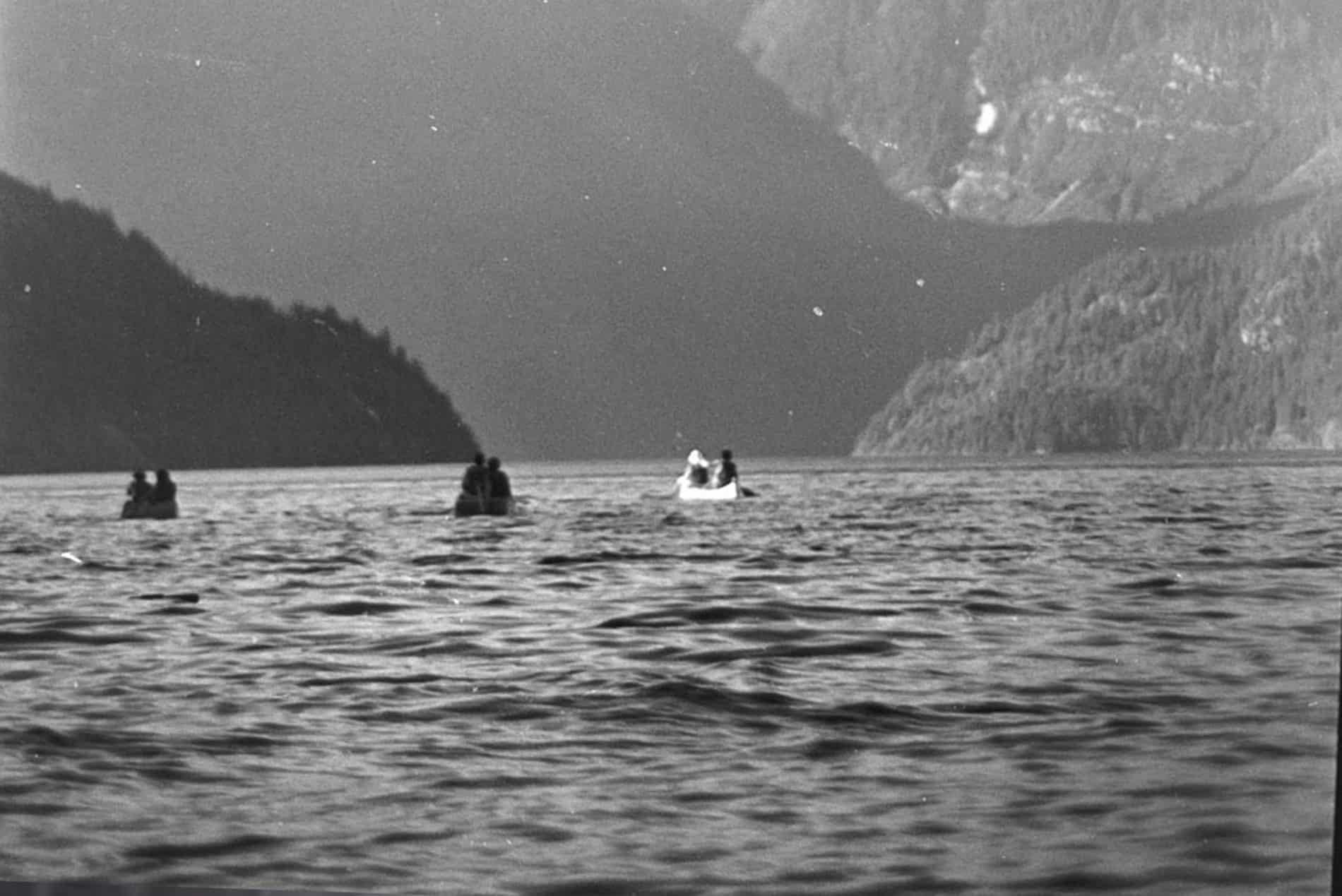 3 canoes paddle the inside passage