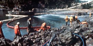 the united states coast guard cleaning up an oil spill in Exxon Valdez