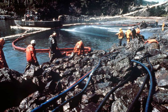 the united states coast guard cleaning up an oil spill in Exxon Valdez