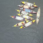 Having The Talk: 8 Questions To Ask Before Tripping Together Group of tandem canoeists gather to have a talk
