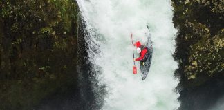 a kayaker hucking off a waterfall, one of many kayaking slang terms