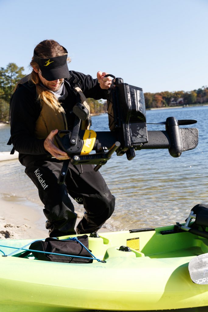 Kevin Whitley installing pedal system on Ocean Kayak Malibu Pedal Kayak