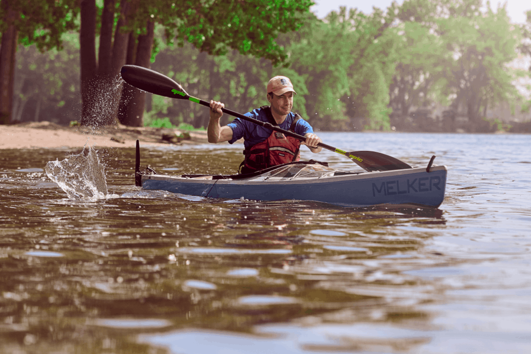 man paddles the Melker Ulvön HV touring kayak