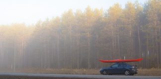 car with kayak on roof
