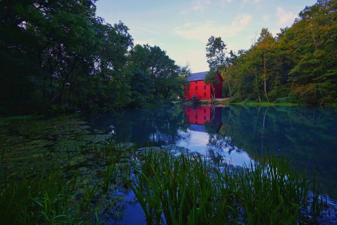 The scenic Alley Mill is located in the Ozark National Scenic Riverways and now operates as a museum. | Photo: Courtesy VisitMO.com