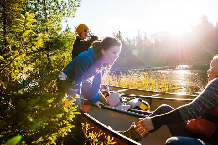 Paddlers enjoying comfortable canoe seats