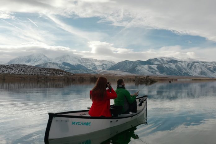 Two people paddling in a MyCanoe POP folding canoe