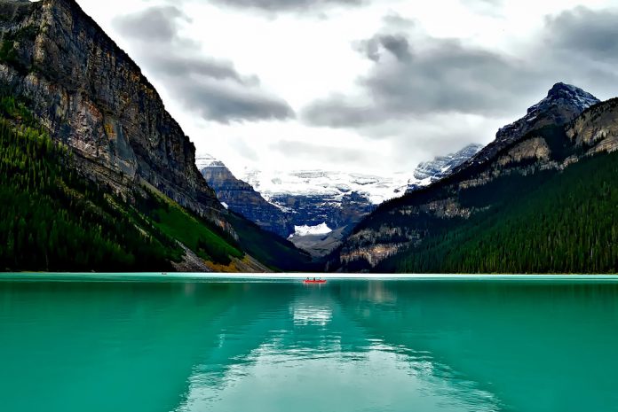 Red canoe on the waters of Lake Louise