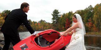 husband and wife fight over a kayak at wedding