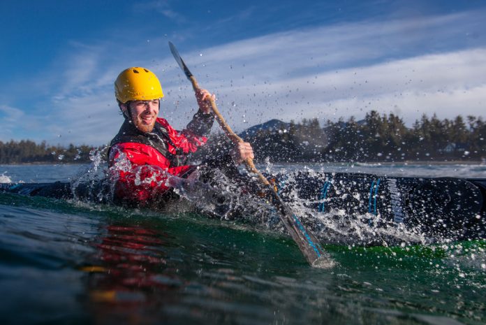 Person paddling a kayak