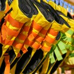 How To Choose A PFD For Ultimate Safety & Comfort On The Water Life jackets hanging on a rack